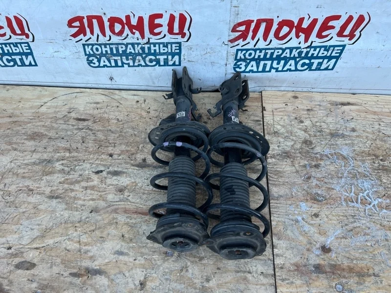 Стойка Nissan Juke E43031KC2B YF15 HR15DE, передняя