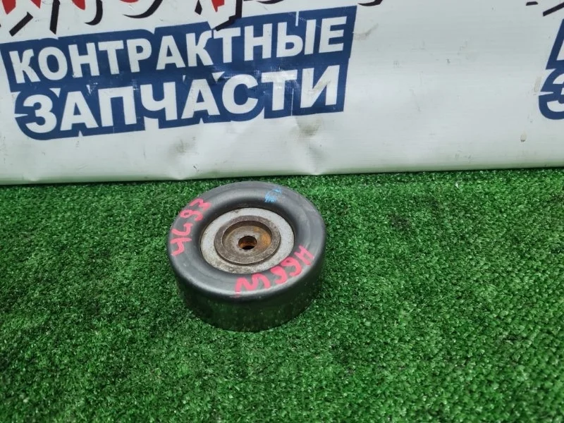 Ролик натяжной Mitsubishi Pajero Io MD308882 H66W 4G93