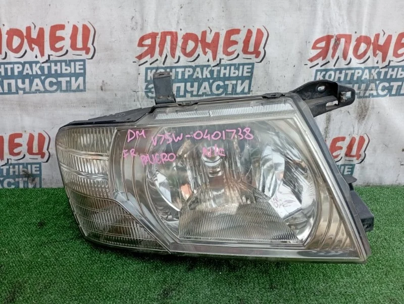 Фара Mitsubishi Pajero MN117098 V75W 6G74, передняя правая