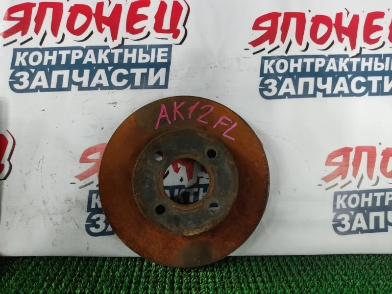 Тормозной диск Nissan March 40206AX000 AK12 CR12DE, передний