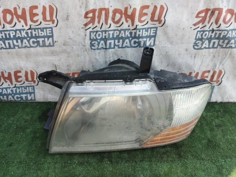 Фара Mitsubishi Pajero V73W 6G72, передняя левая