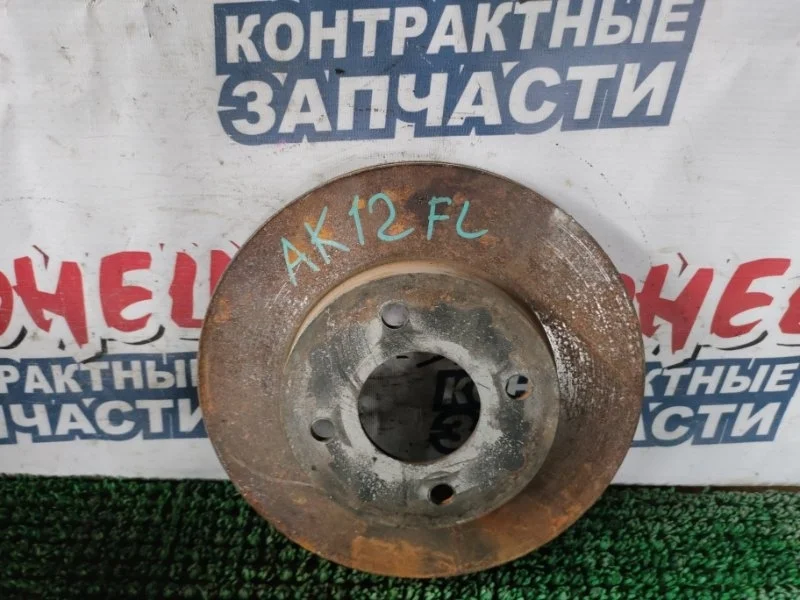 Тормозной диск Nissan March 40206AX000 AK12 CR12DE, передний