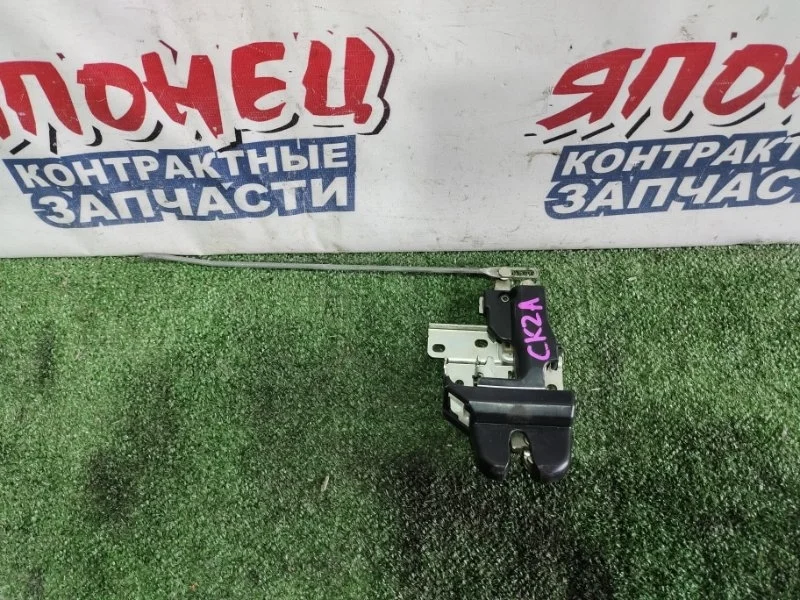 Замок багажника Mitsubishi Lancer MR200359 CK2A 4G15