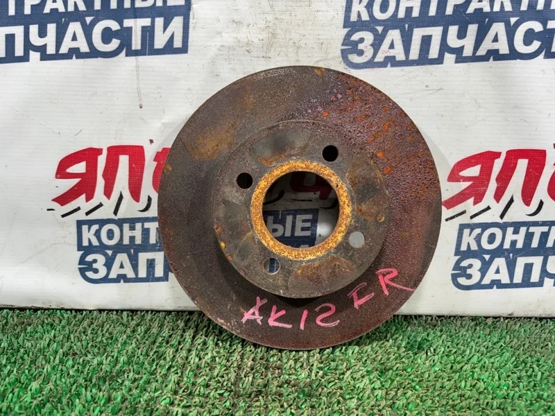 Тормозной диск Nissan March 40206AX000 AK12 CR12DE, передний