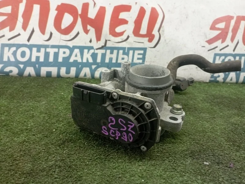 Дроссельная заслонка Toyota Vitz 2203023010 SCP90 2SZ-FE
