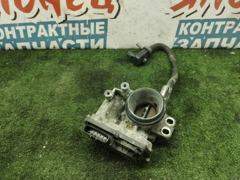 Дроссельная заслонка Toyota Ractis 2203023010 SCP100 2SZ-FE