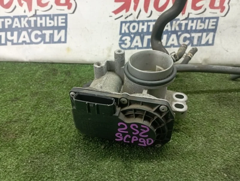 Дроссельная заслонка Toyota Vitz 2203023010 SCP90 2SZ-FE