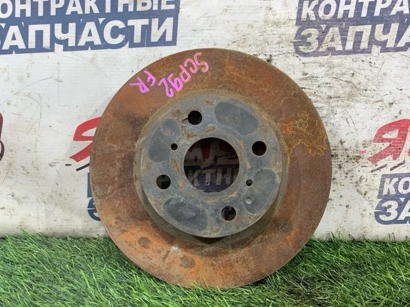 Тормозной диск Toyota Belta 4351252120 SCP92 2SZ-FE, передний