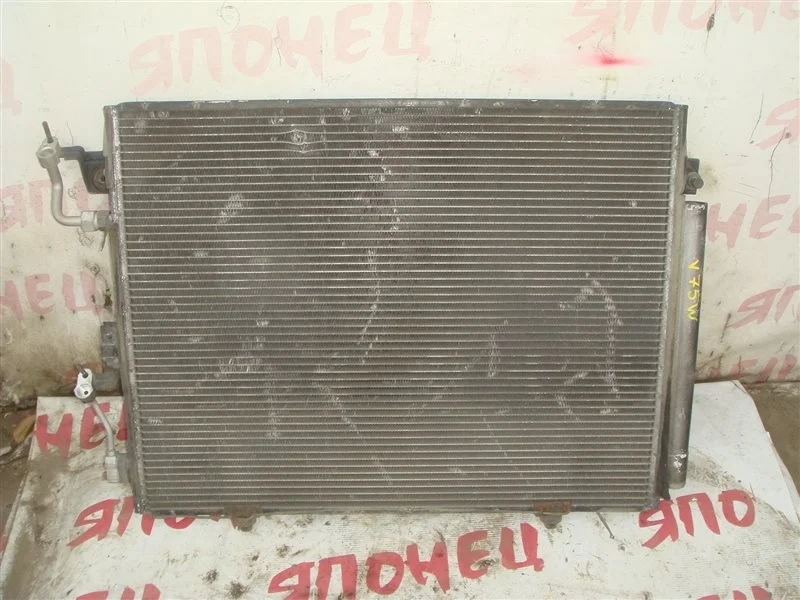 Радиатор кондиционера Mitsubishi Pajero MN123332 V75W 6G74