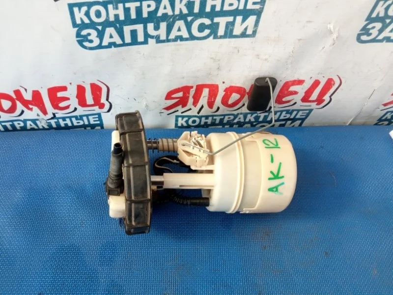 Топливный насос Nissan March 17040AX000 AK12 CR12DE