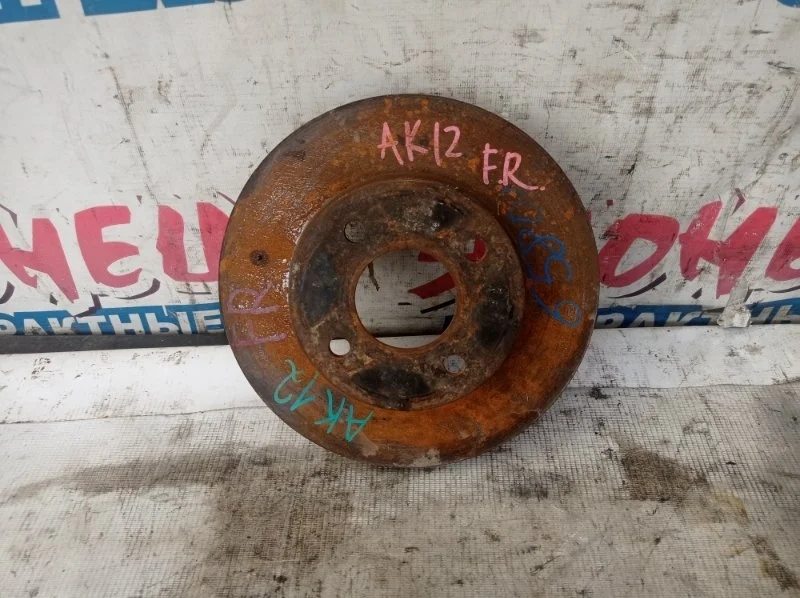 Тормозной диск Nissan March 40206AX000 AK12 CR12DE, передний