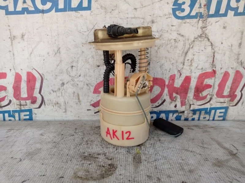 Топливный насос Nissan March 17040AX000 AK12 CR12DE