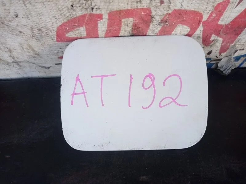 Лючок бензобака Toyota Carina 7735020230 AT192 5A-FE