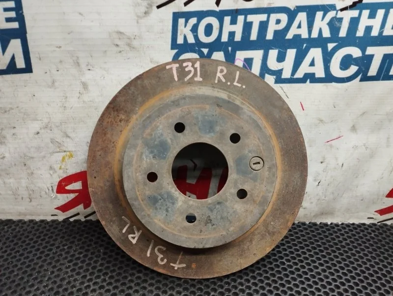 Тормозной диск Nissan X-Trail 432068H701 T31 MR20DE, задний