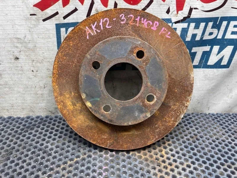 Тормозной диск Nissan March 40206AX000 AK12 CR12DE, передний