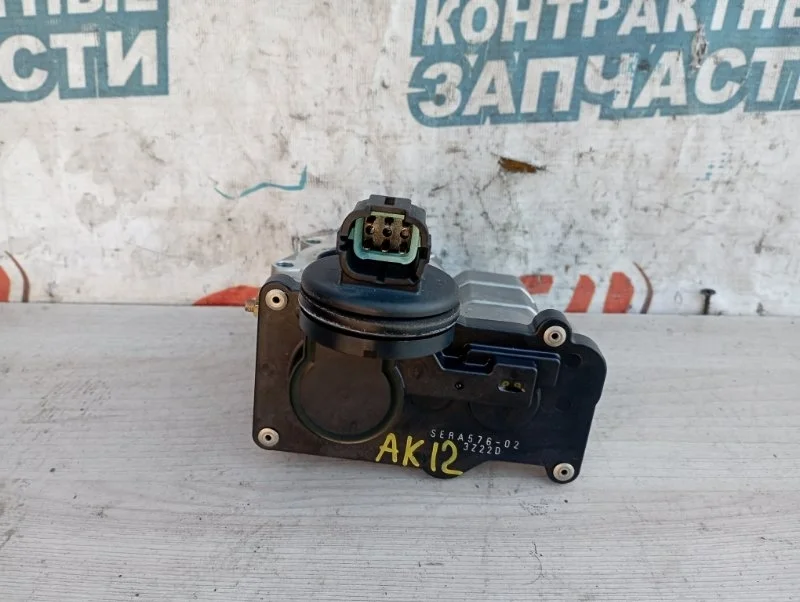Дроссельная заслонка Nissan March 16119AX000 AK12 CR12DE