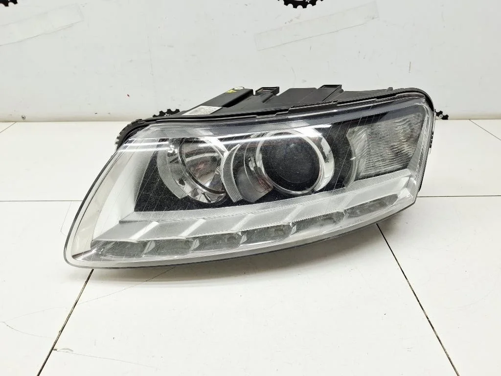Фара левая Audi A6 4F0941003 (С6)