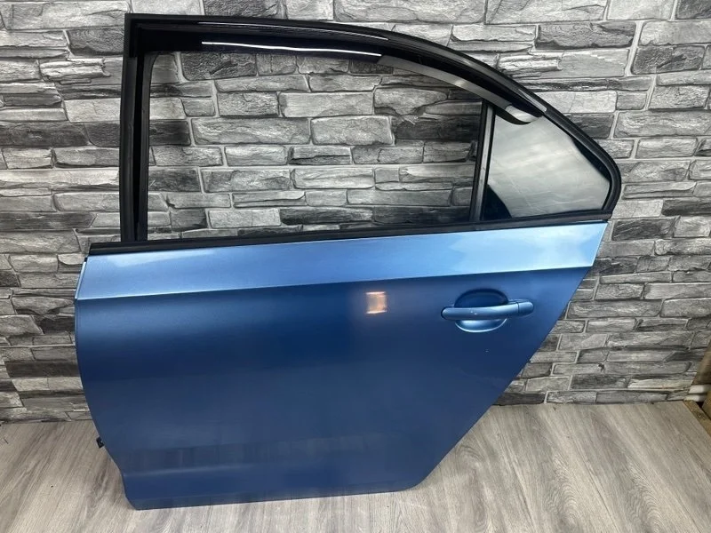 Дверь задняя левая Skoda Rapid