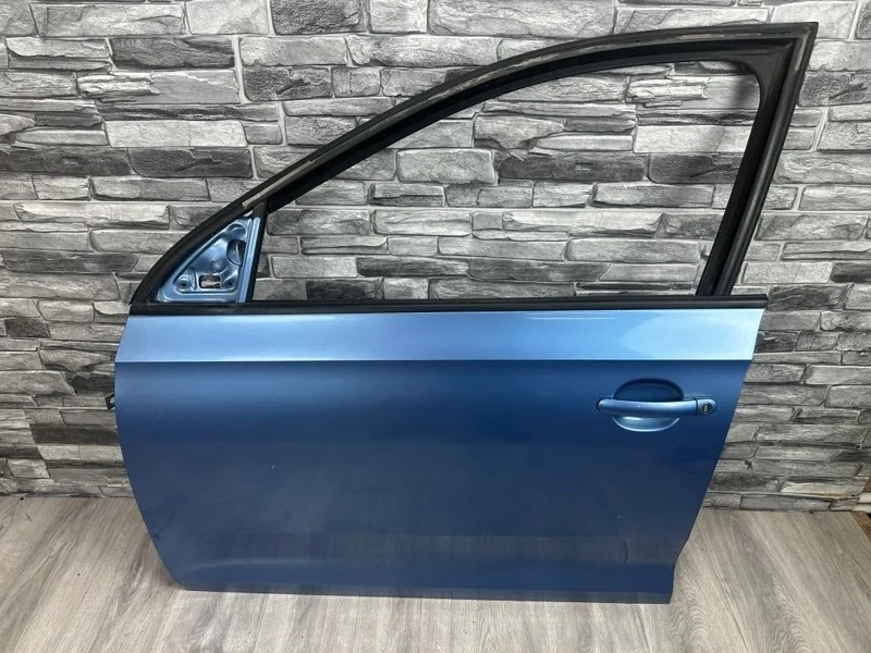 Дверь передняя левая Skoda Rapid