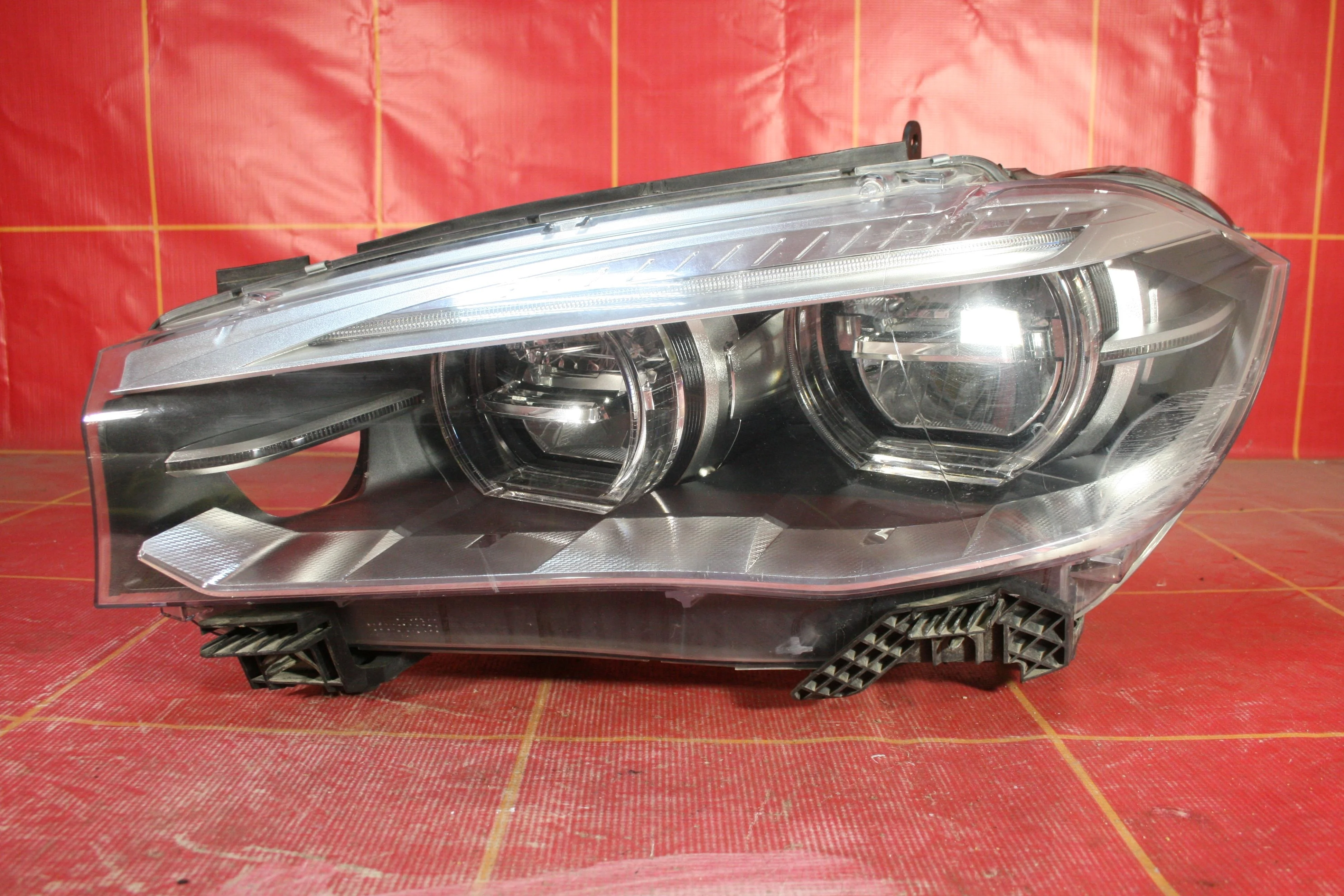 Фара левая BMW X5