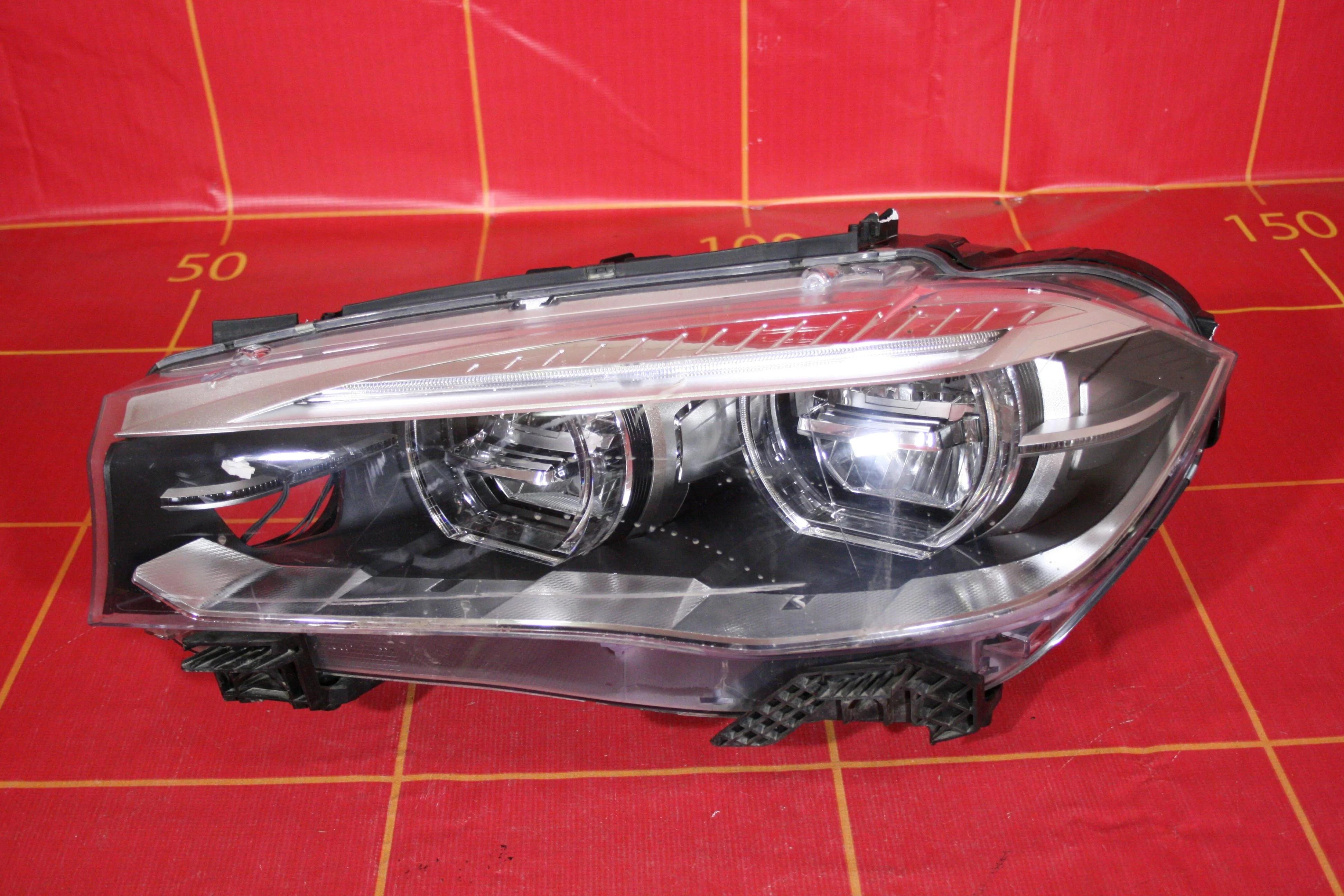 Фара левая BMW X5