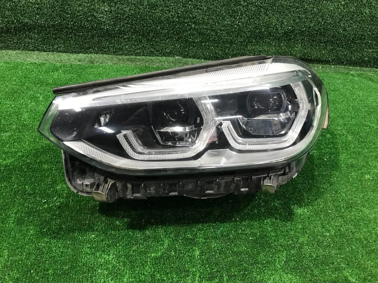 Фара левая BMW X3