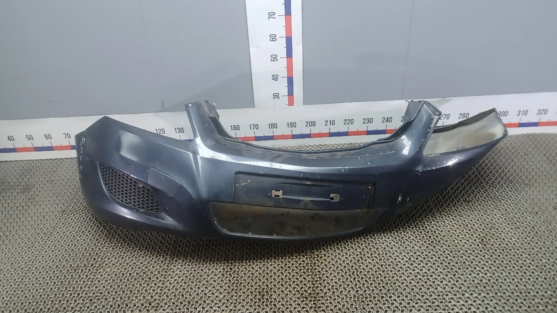 Бампер передний Opel Zafira B