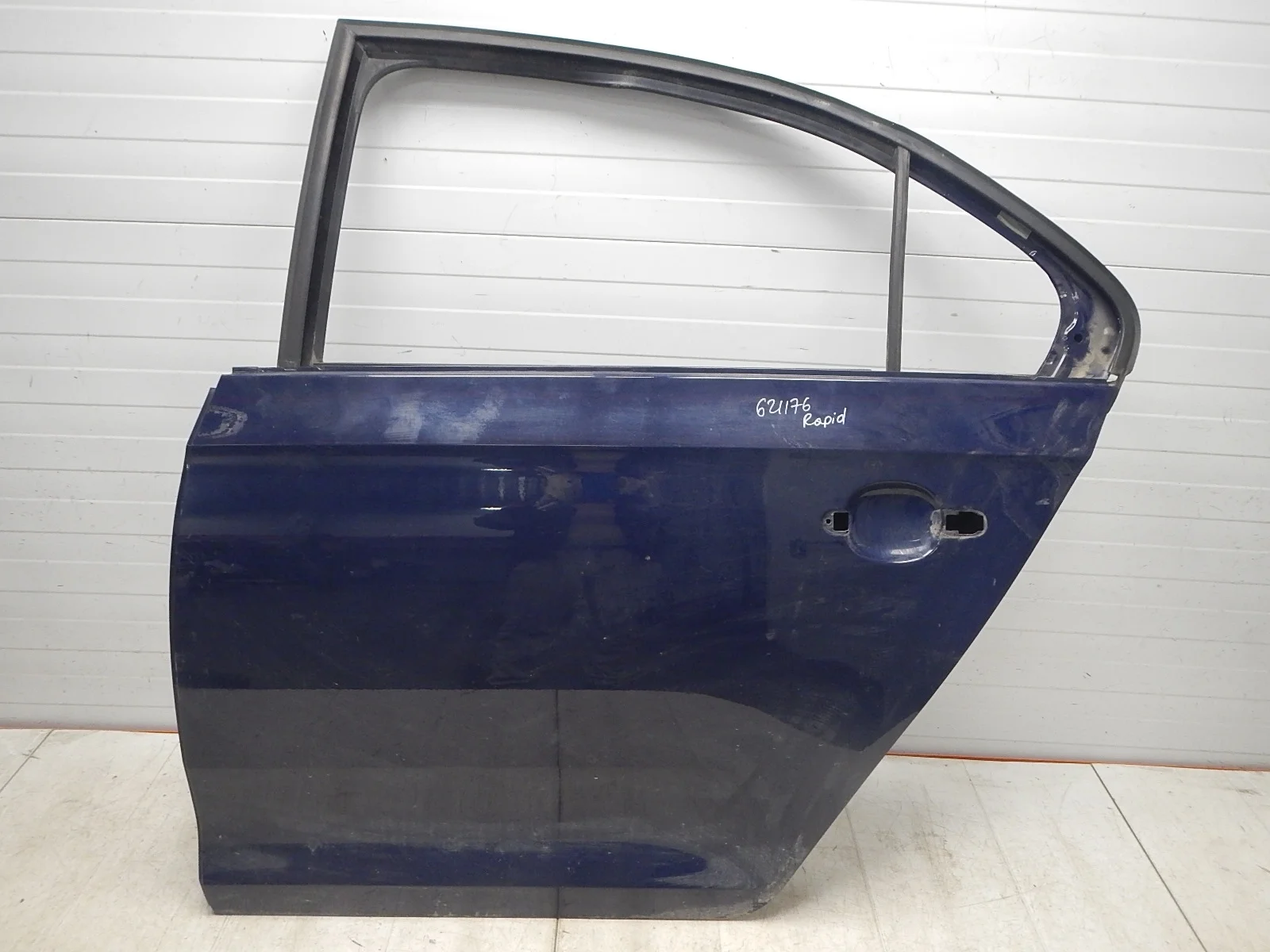 Дверь задняя левая Skoda Rapid