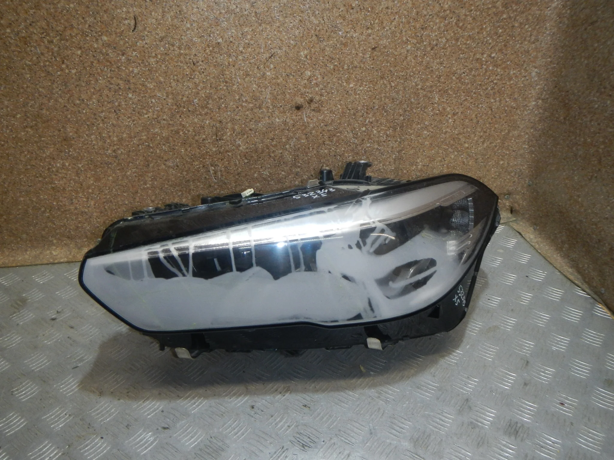 Фара левая BMW X5
