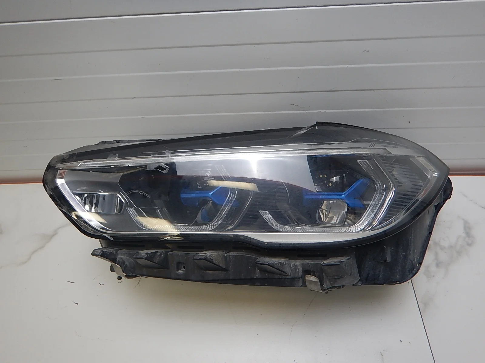 Фара левая BMW X5