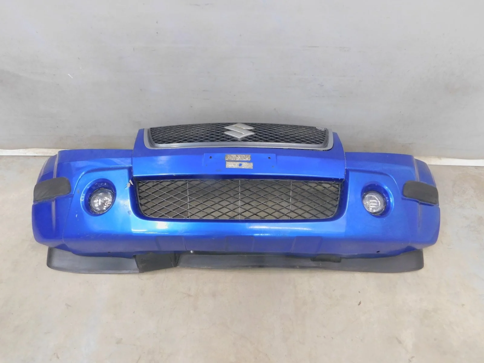 Бампер передний Suzuki Grand Vitara