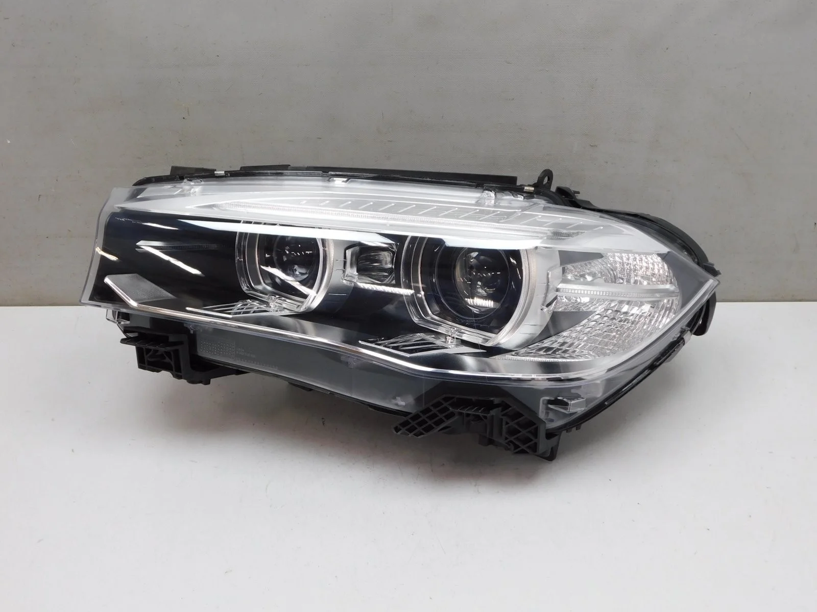 Фара левая BMW X5