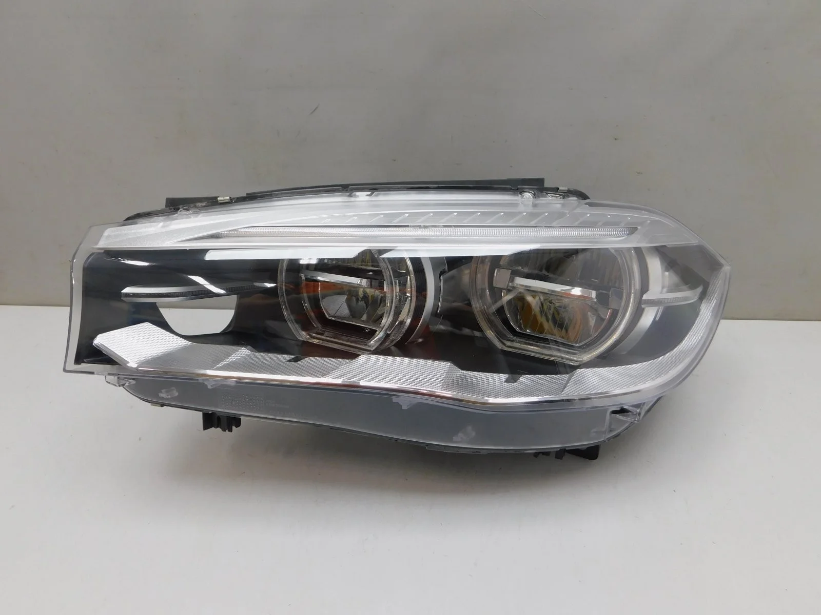 Фара левая BMW X5