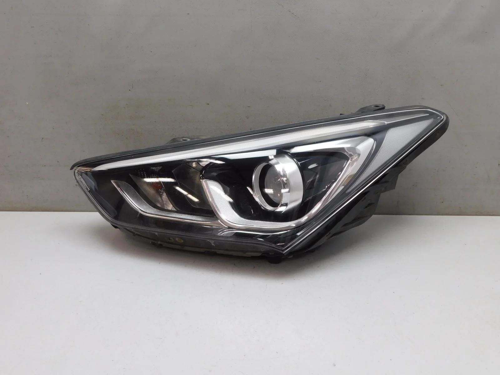 Фара левая Hyundai Grand Santa Fe/Santa Fe