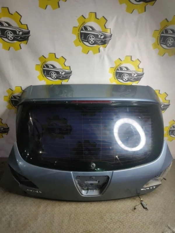 Дверь багажника Opel Astra J