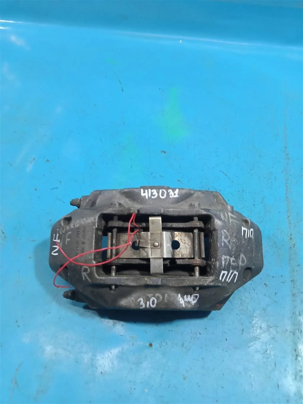 Суппорт тормозной передний правый VW Touareg NF (