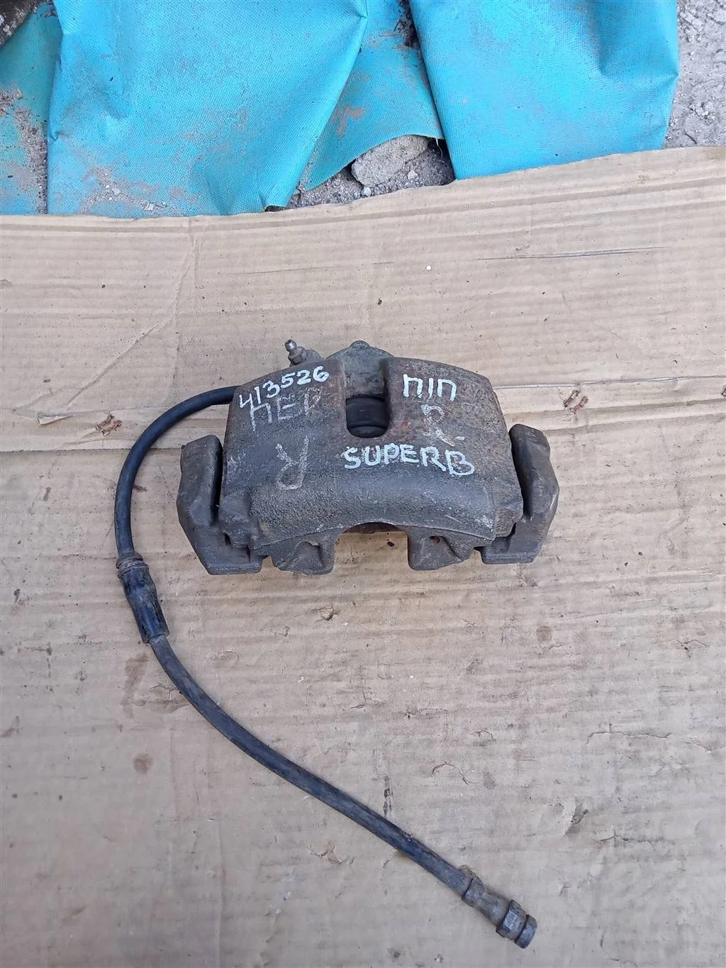 Суппорт тормозной передний правый Skoda Superb 20