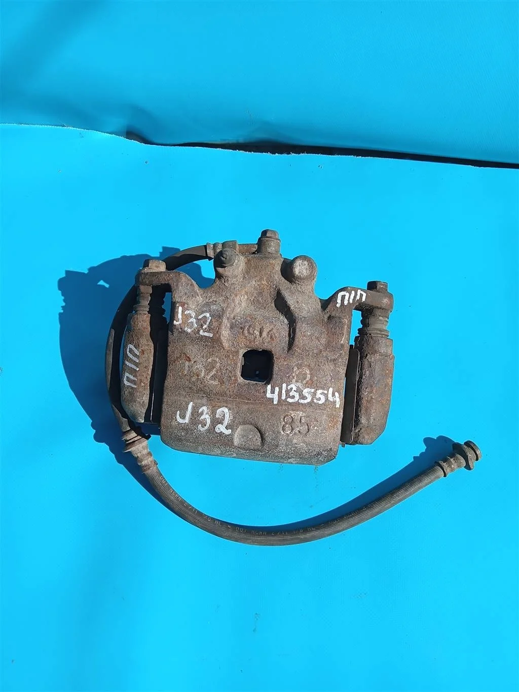 Суппорт тормозной передний правый Nissan Teana J3