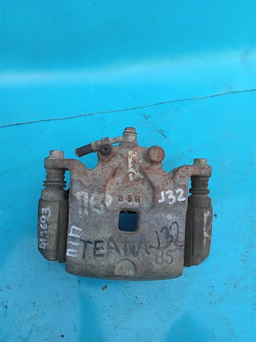 Суппорт тормозной передний правый Nissan Teana J3