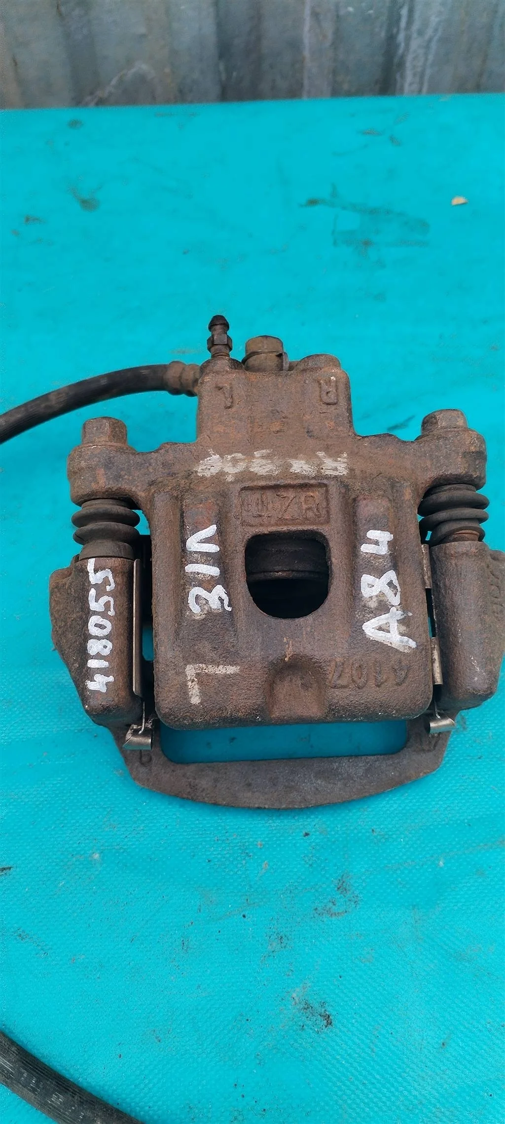 Суппорт тормозной задний левый Lexus RX 300/330/3