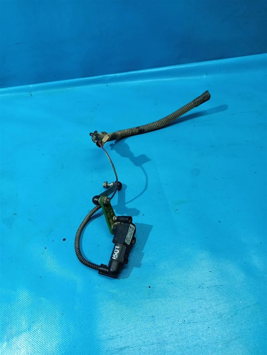 Датчик положения кузова VW Touareg NF (2011-2018)