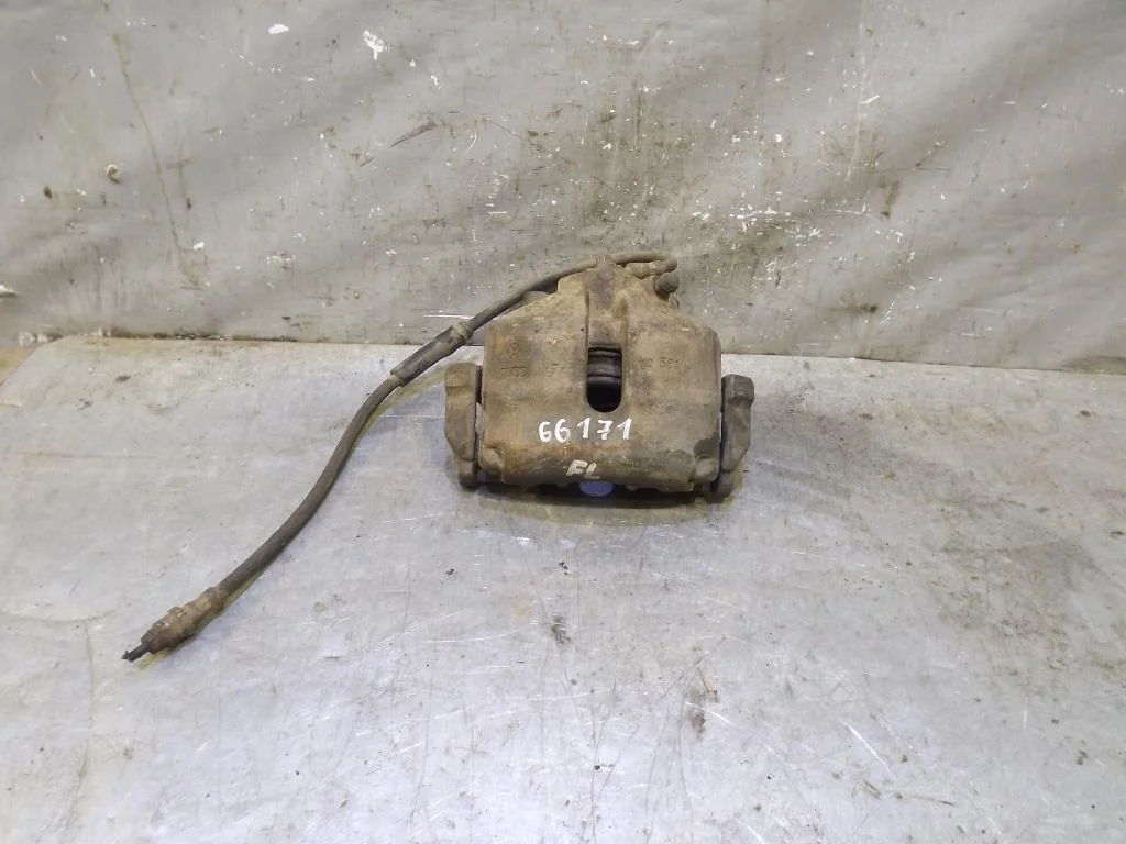 Суппорт передний левый VW Passat (B7) 2011-2015  [1K0615123E]  1.4 16V CAXC в Вологде