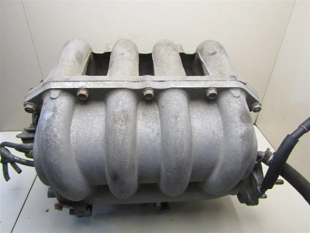 Коллектор впускной Mazda 323 (BJ) 1998-2002  [ZM3913130A]  1.6 ZM в Вологде