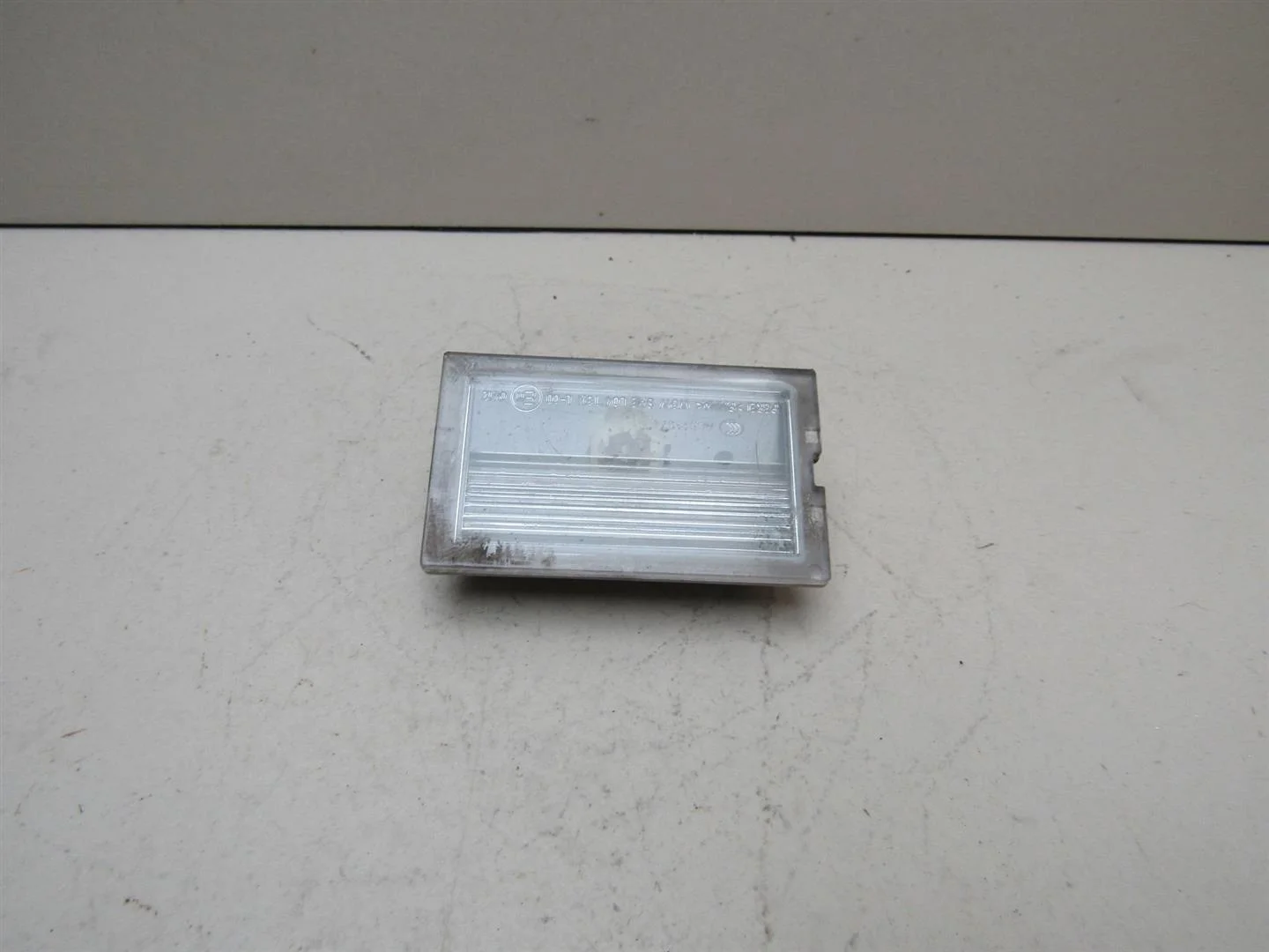 Фонарь подсветки номера Land Rover Discovery III 2004-2009  [XFC500040]  2.7 в Вологде