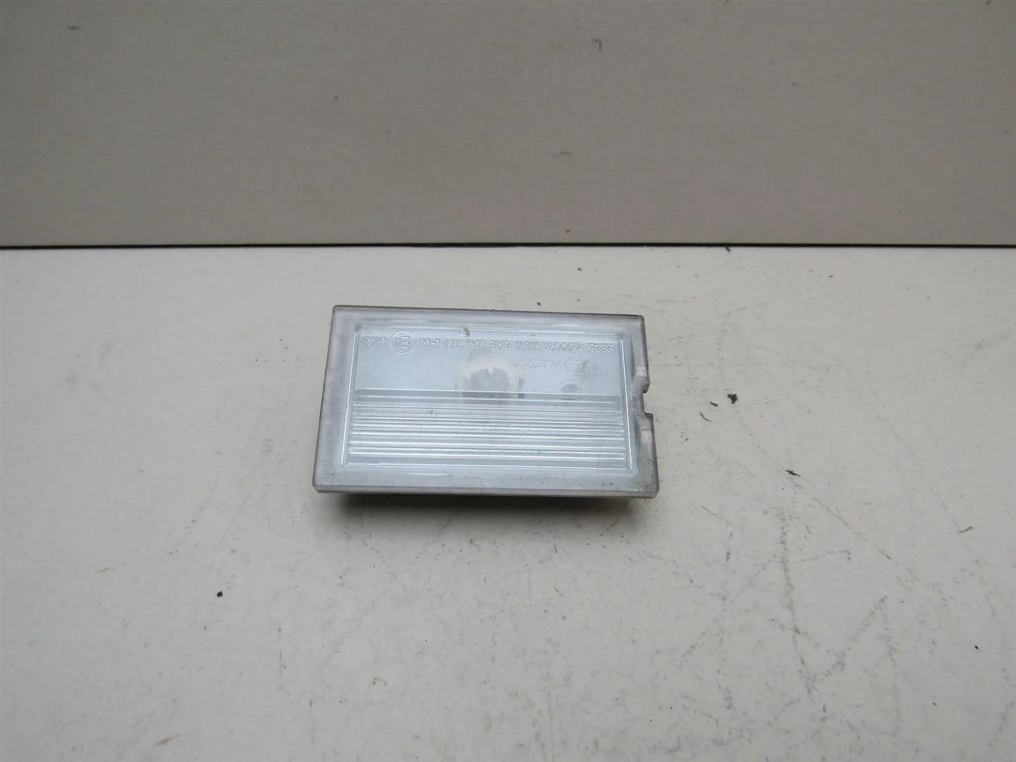 Фонарь подсветки номера Land Rover Discovery III 2004-2009  [XFC500040]  2.7 в Вологде