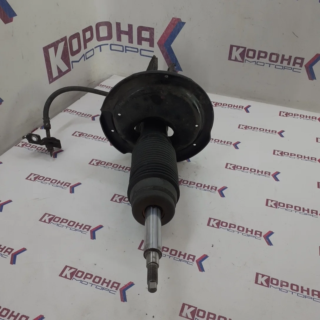 Амортизатор передний левый Б/У только аморт