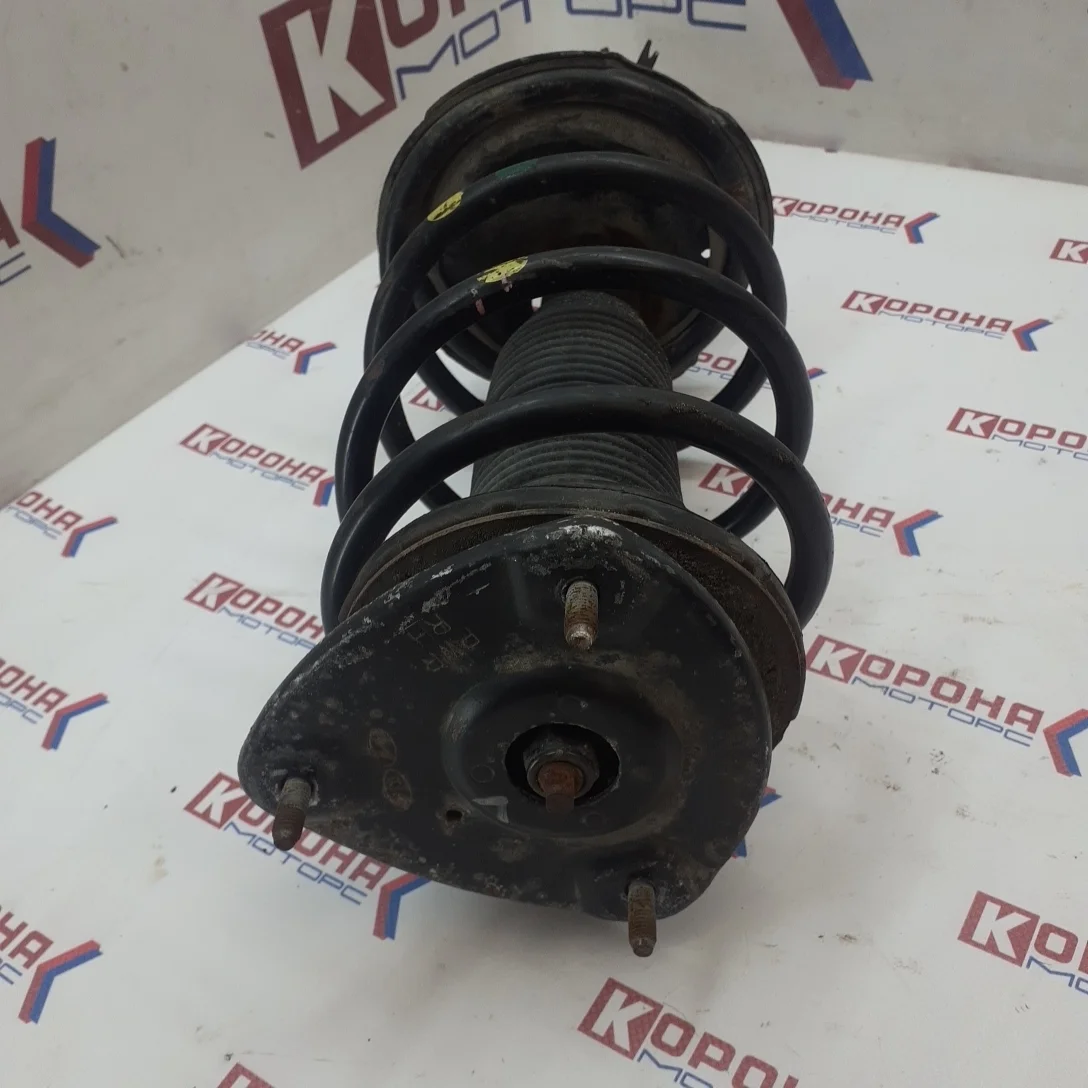 Амортизатор передний правый Б/У оригинал в сборе