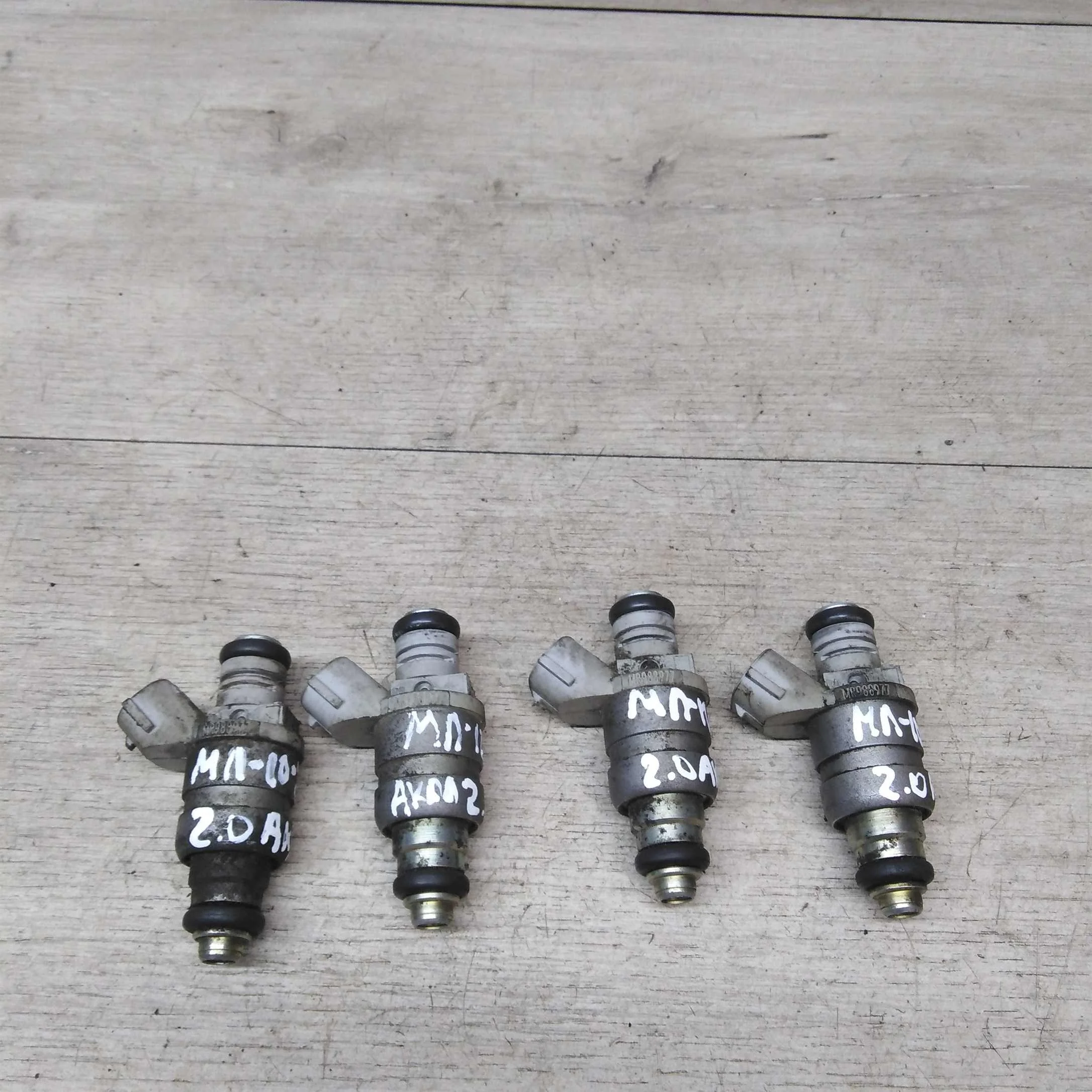 форсунка топливная mitsubishi lancer 10  (арт. 18706)