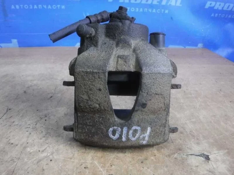 Суппорт тормозной передний правый Volkswagen Polo