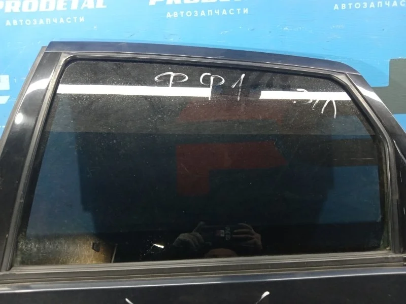 Стекло двери заднее левое Ford Focus 1998-2005